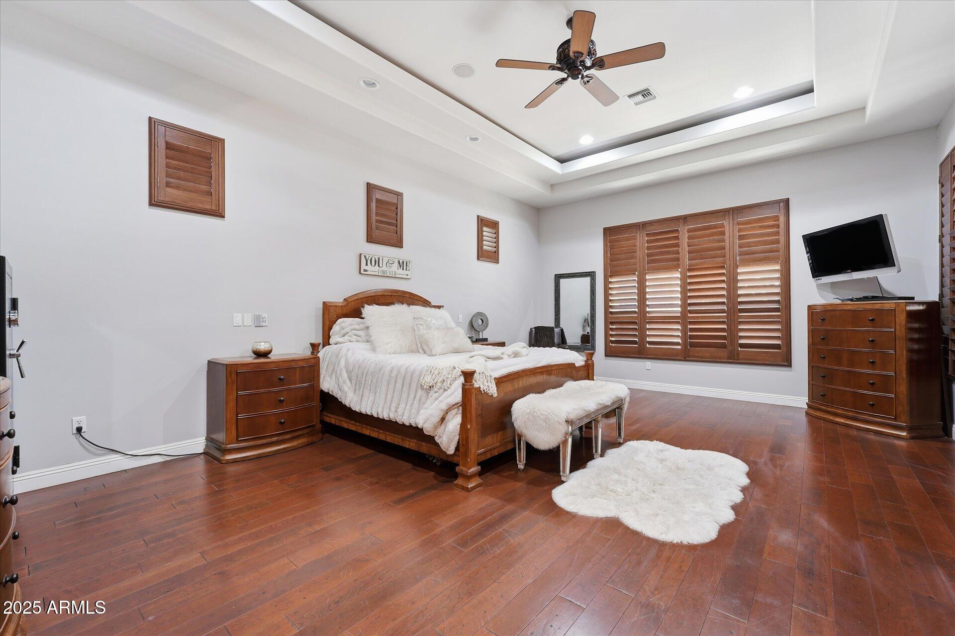 3121 East Bonanza Court Gilbert, AZ 85297 - Photo 39 of 83 a bedroom with furniture and a flat screen tv