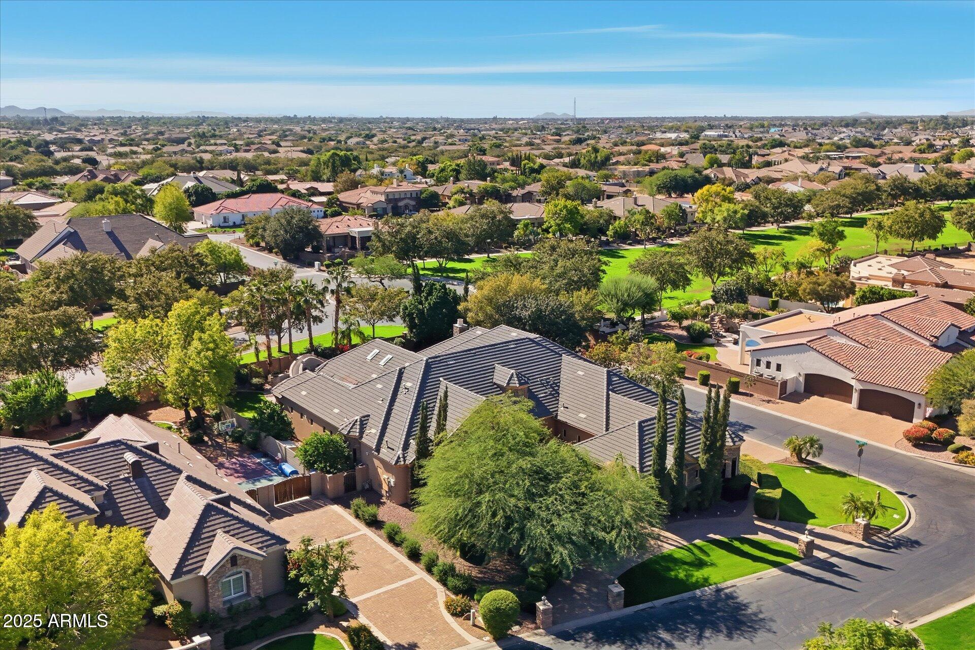 3121 East Bonanza Court Gilbert, AZ 85297 - Photo 79 of 83 an aerial view of a city with lots of residential buildings