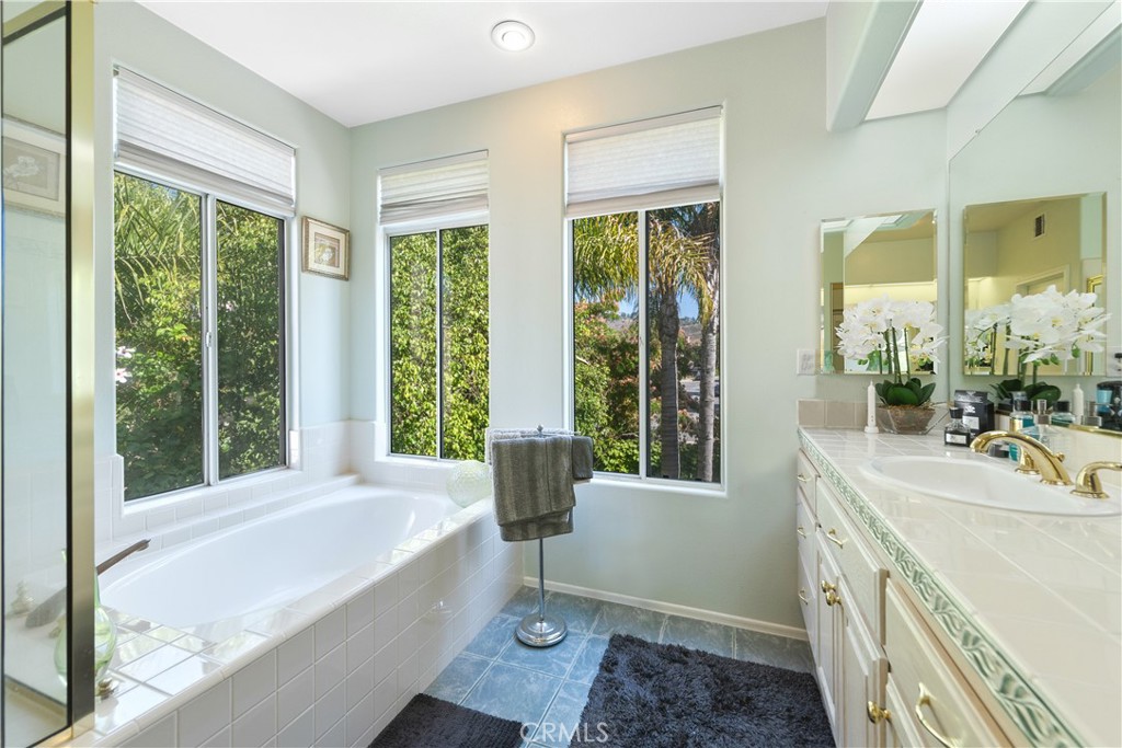 11312 Broadview Drive Moorpark, CA 93021 - Photo 37 of 50 Primary bathroom with windows and shades