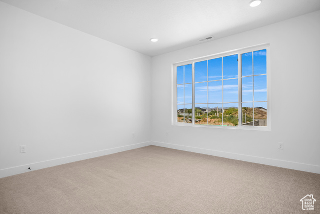 1631 West Century Lane, Unit B Mapleton, UT 84664 - Photo 14 of 33 Spare room with light colored carpet and recessed lighting