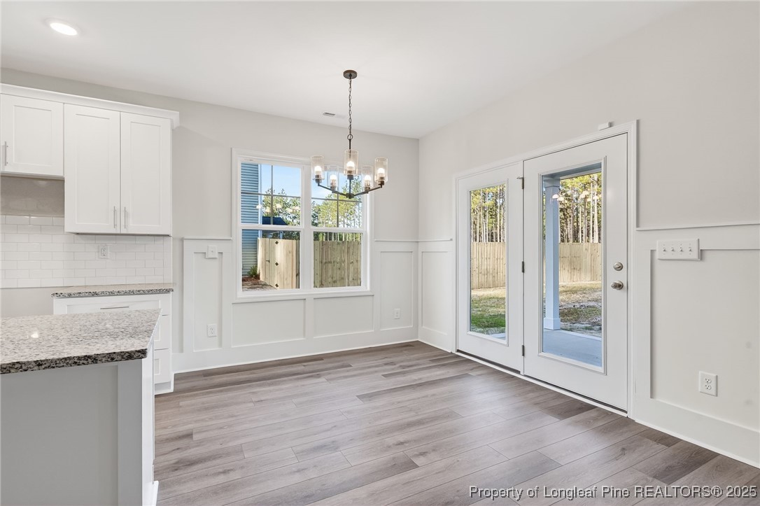 2154 Montrose (lot 6) Road Raeford, NC 28376 - Photo 18 of 44 a view of an empty room with kitchen and window