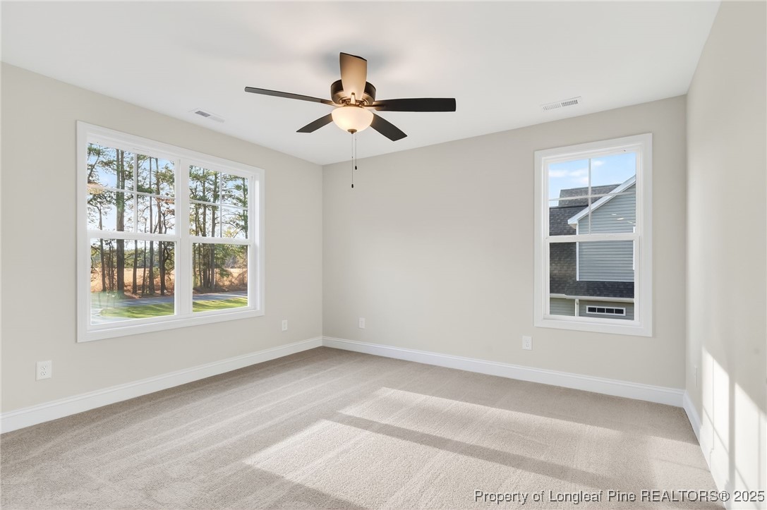 2154 Montrose (lot 6) Road Raeford, NC 28376 - Photo 29 of 44 a view of an empty room with a window and wooden floor