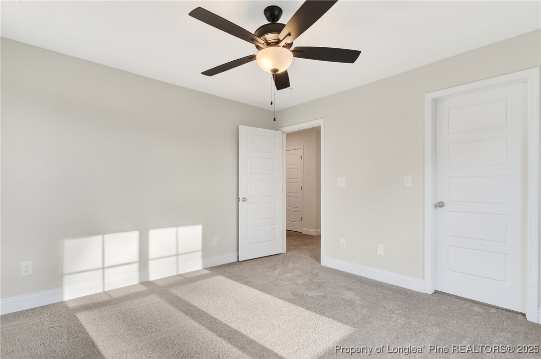 2154 Montrose (lot 6) Road Raeford, NC 28376 - Photo 30 of 44 a view of a livingroom with a ceiling fan and window