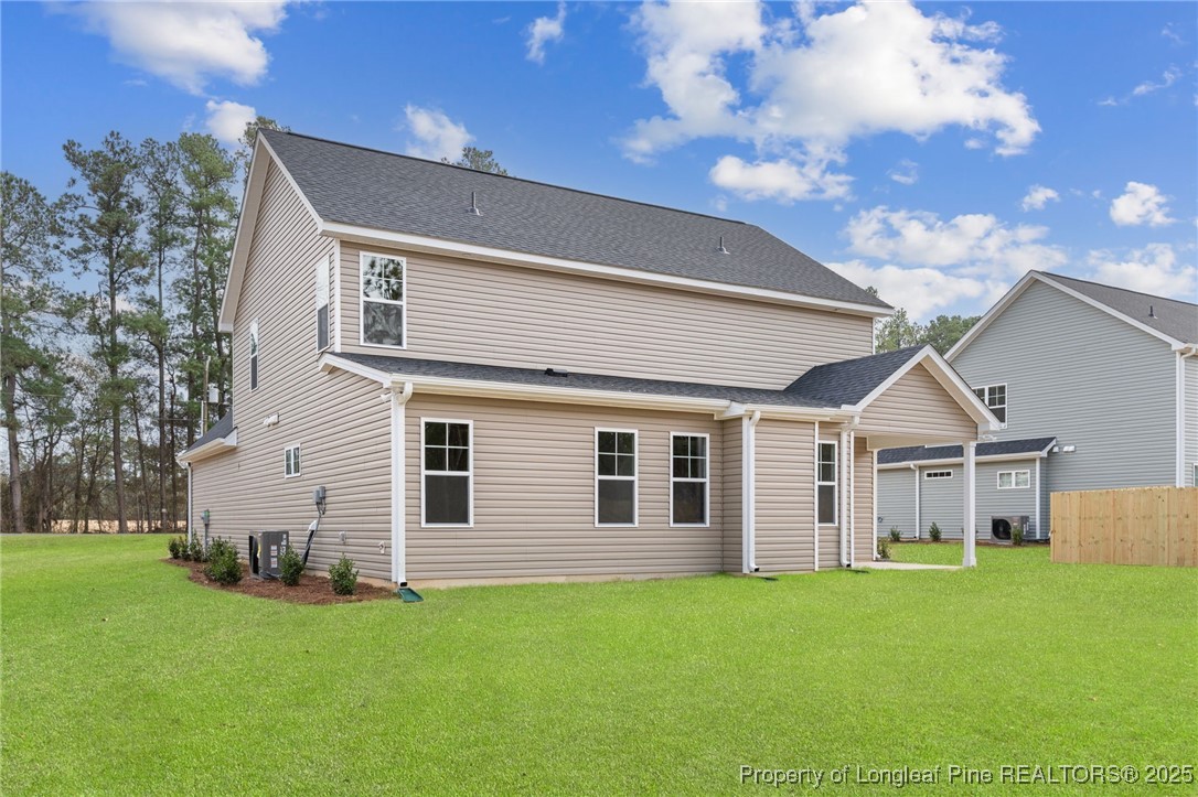 2154 Montrose (lot 6) Road Raeford, NC 28376 - Photo 42 of 44 a view of a house with backyard