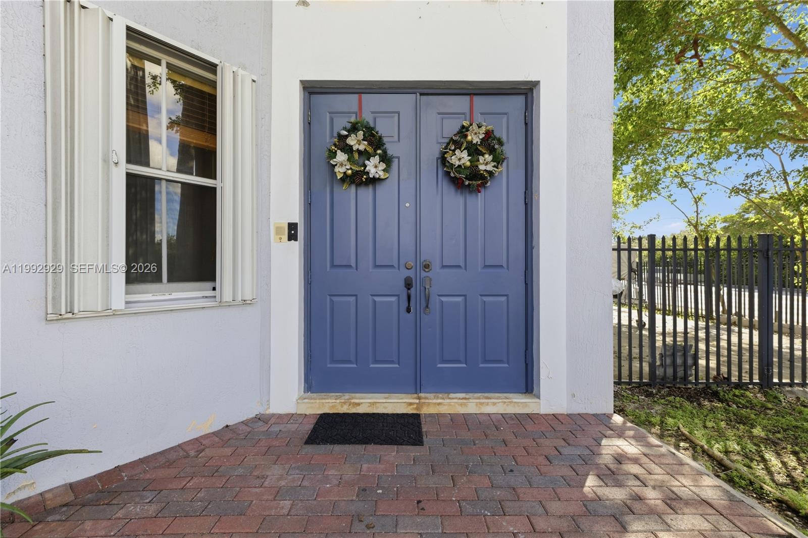 15184 Southwest 20th Street Miami, FL 33185 - Photo 4 of 39 a view of an entryway