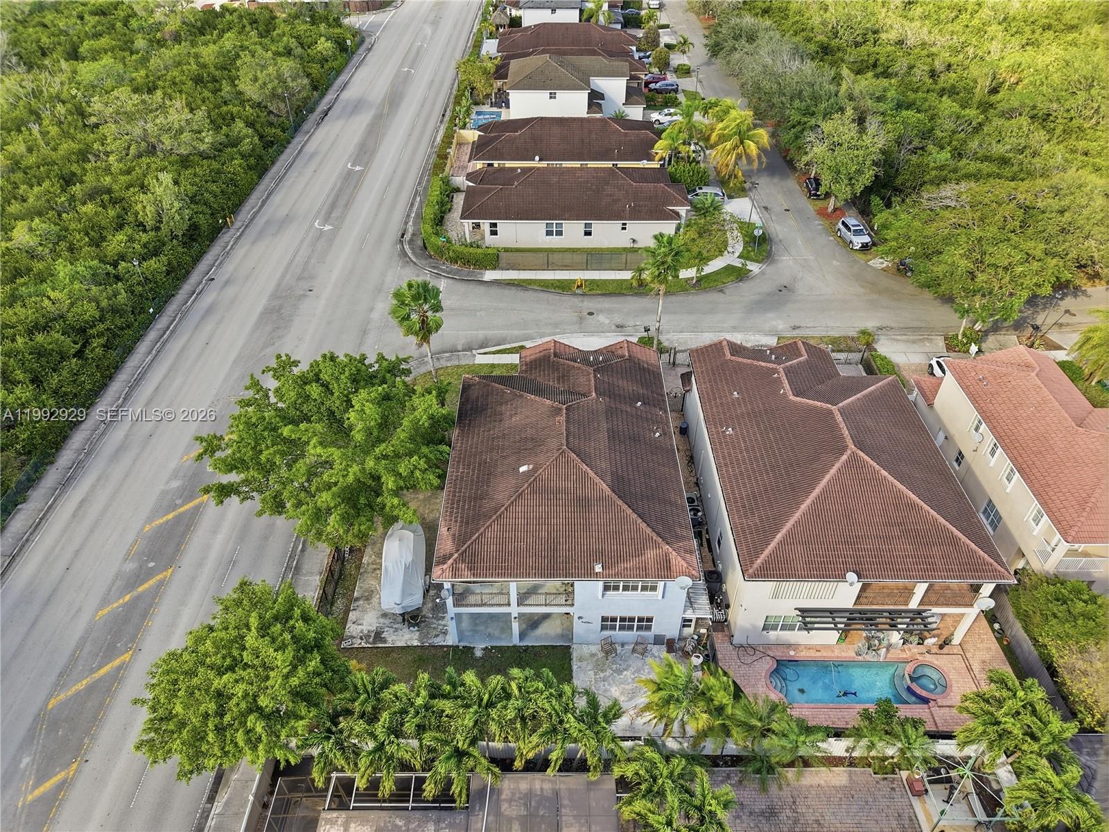 15184 Southwest 20th Street Miami, FL 33185 - Photo 7 of 39 an aerial view of a house