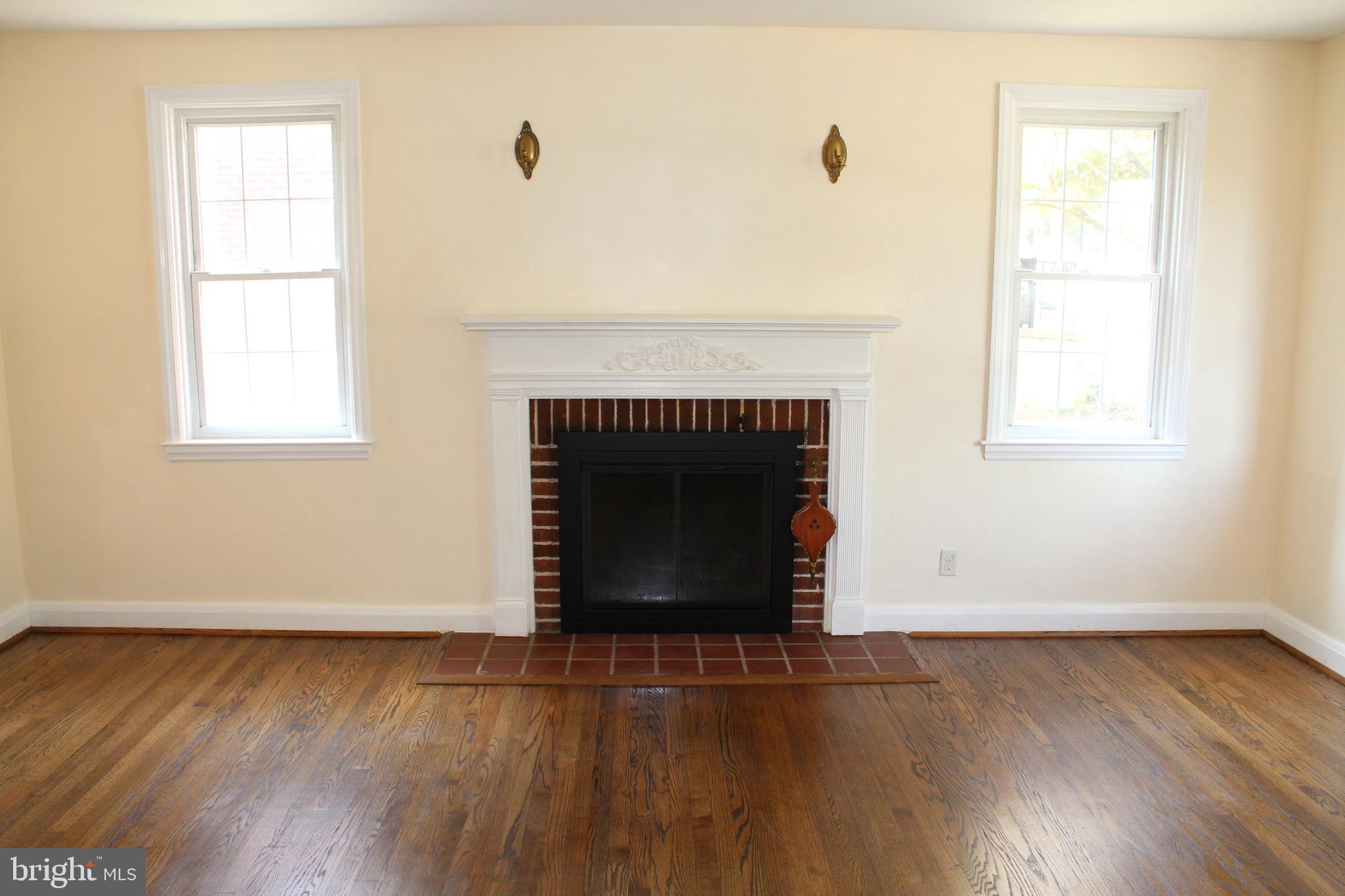 6119 Regent Park Road Baltimore, MD 21228 - Photo 21 of 55 Refinished Hardwood Floors in Living Room