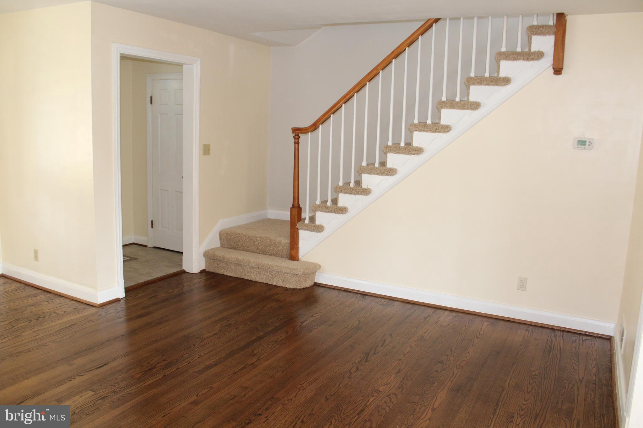 6119 Regent Park Road Baltimore, MD 21228 - Photo 25 of 55 View of stairs from Living Room