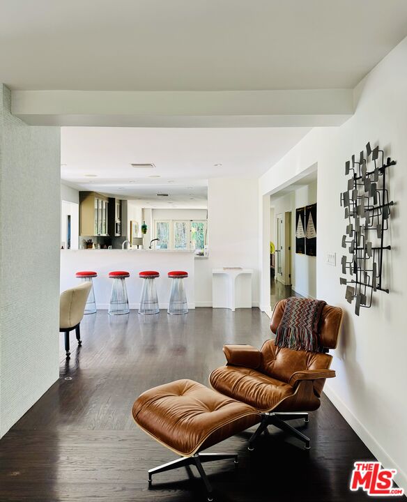 1555 Rising Glen Road Los Angeles, CA 90069 - Photo 4 of 19 a living room with furniture and wooden floor