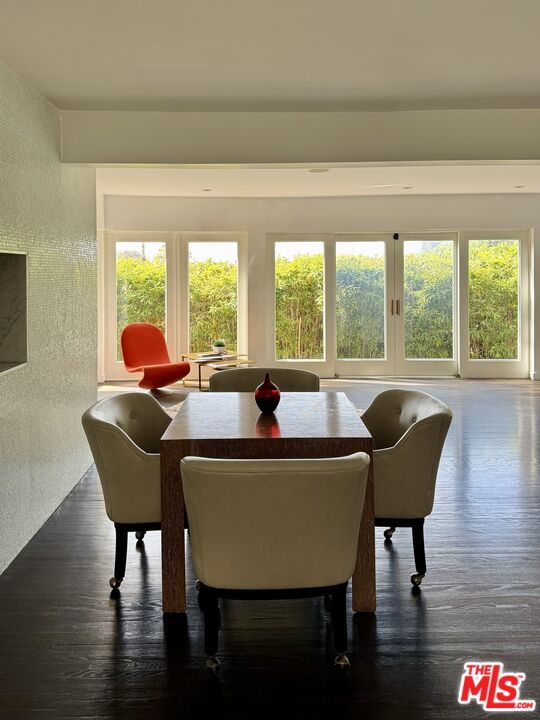 1555 Rising Glen Road Los Angeles, CA 90069 - Photo 5 of 19 a living room with furniture and a large window