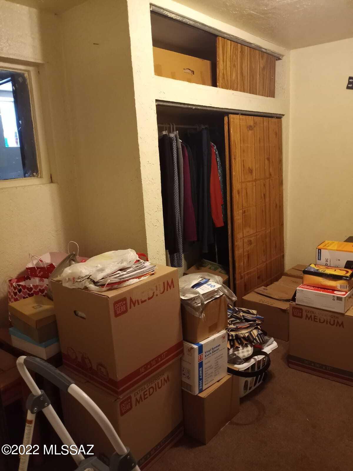 Undisclosed Address Douglas, AZ 85607 - Photo 15 of 16 a room with a stove and a table