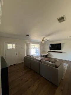 a kitchen with stainless steel appliances granite countertop a sink and a microwave