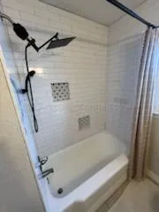 a bathroom with a tub