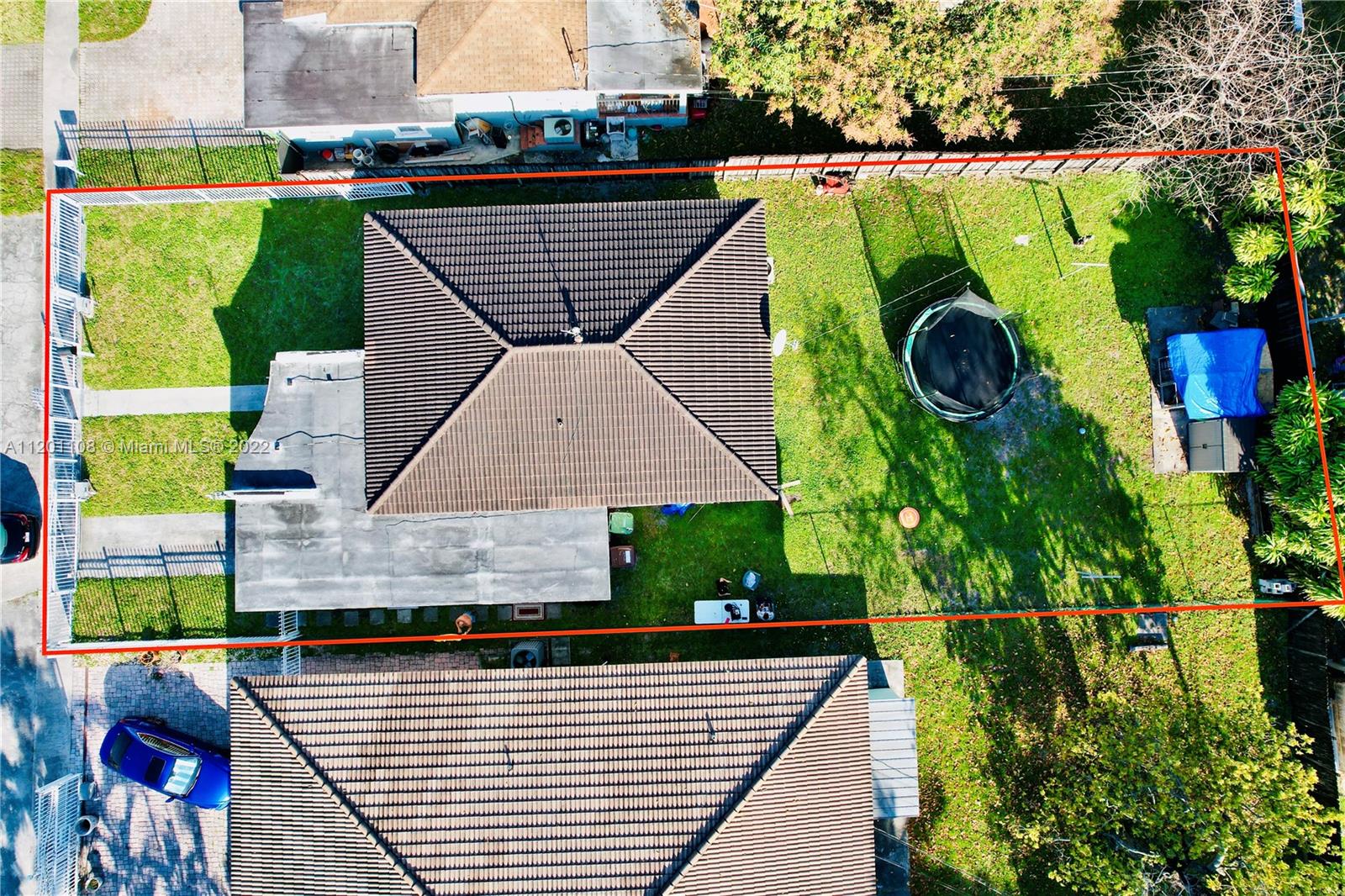 458 Southeast 3rd Street Hialeah, FL 33010 - Photo 7 of 13 an aerial view of a house with a swimming pool