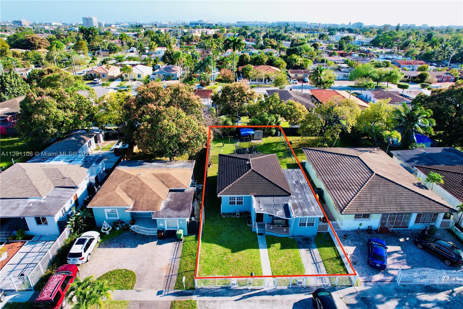 458 Southeast 3rd Street Hialeah, FL 33010 - Photo 8 of 13 an aerial view of multiple houses with yard