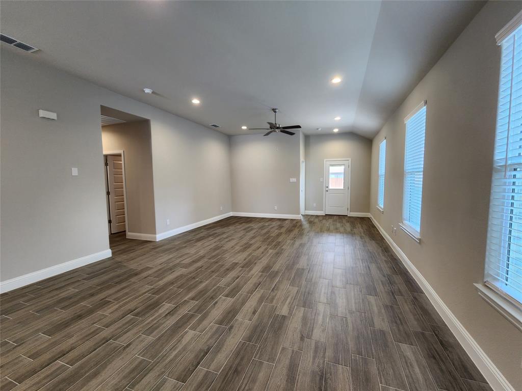 2309 Ruff Road Denton, TX 76205 - Photo 11 of 32 Living room has view of back patio and side yard.