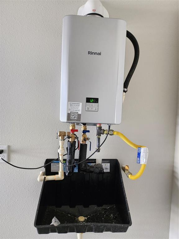 2309 Ruff Road Denton, TX 76205 - Photo 24 of 32 Tankless water heater in garage