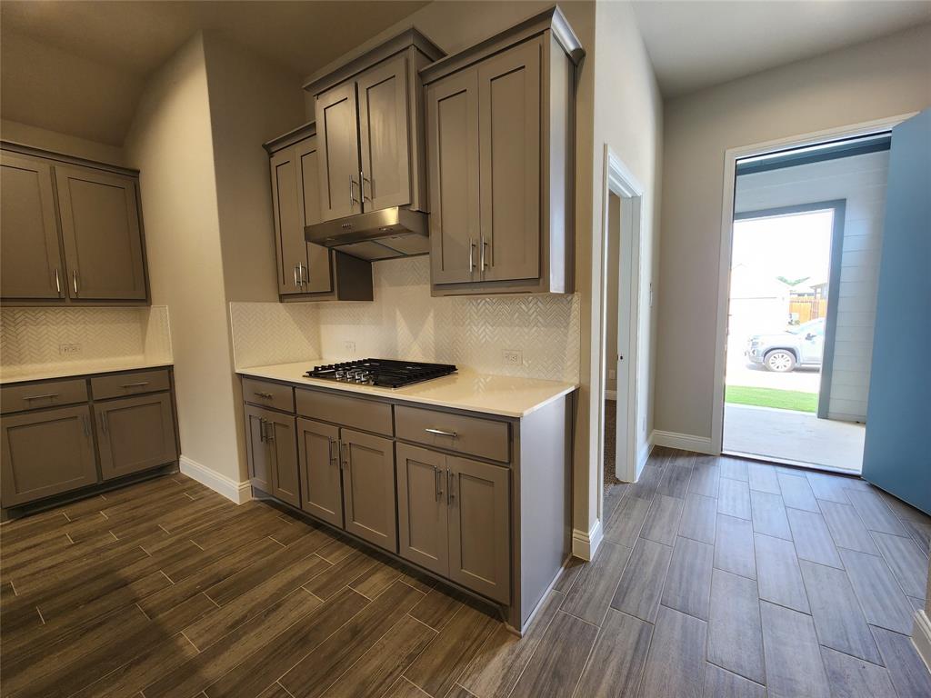 2309 Ruff Road Denton, TX 76205 - Photo 6 of 32 Gas Stovetop with Venthood.
