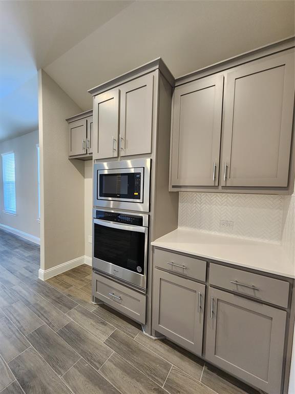 2309 Ruff Road Denton, TX 76205 - Photo 7 of 32 Built in ss Microwave and Oven.
