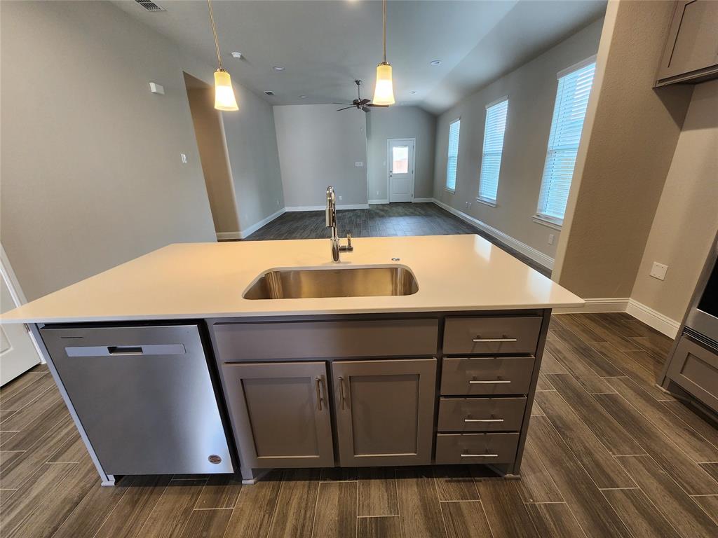 2309 Ruff Road Denton, TX 76205 - Photo 8 of 32 Kitchen is open to Living and Dining area