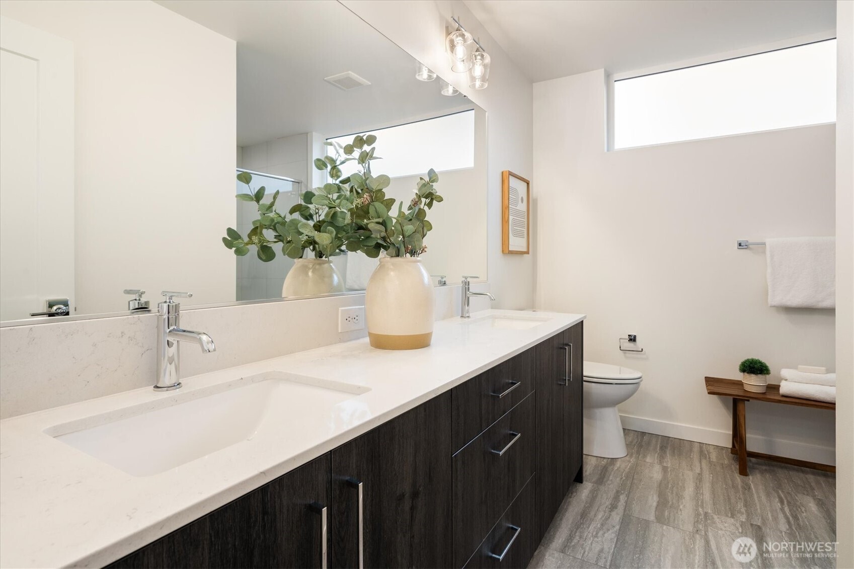 6309 9th Avenue Northeast, Unit D Seattle, WA 98115 - Photo 20 of 28 a bathroom with a sink and a mirror