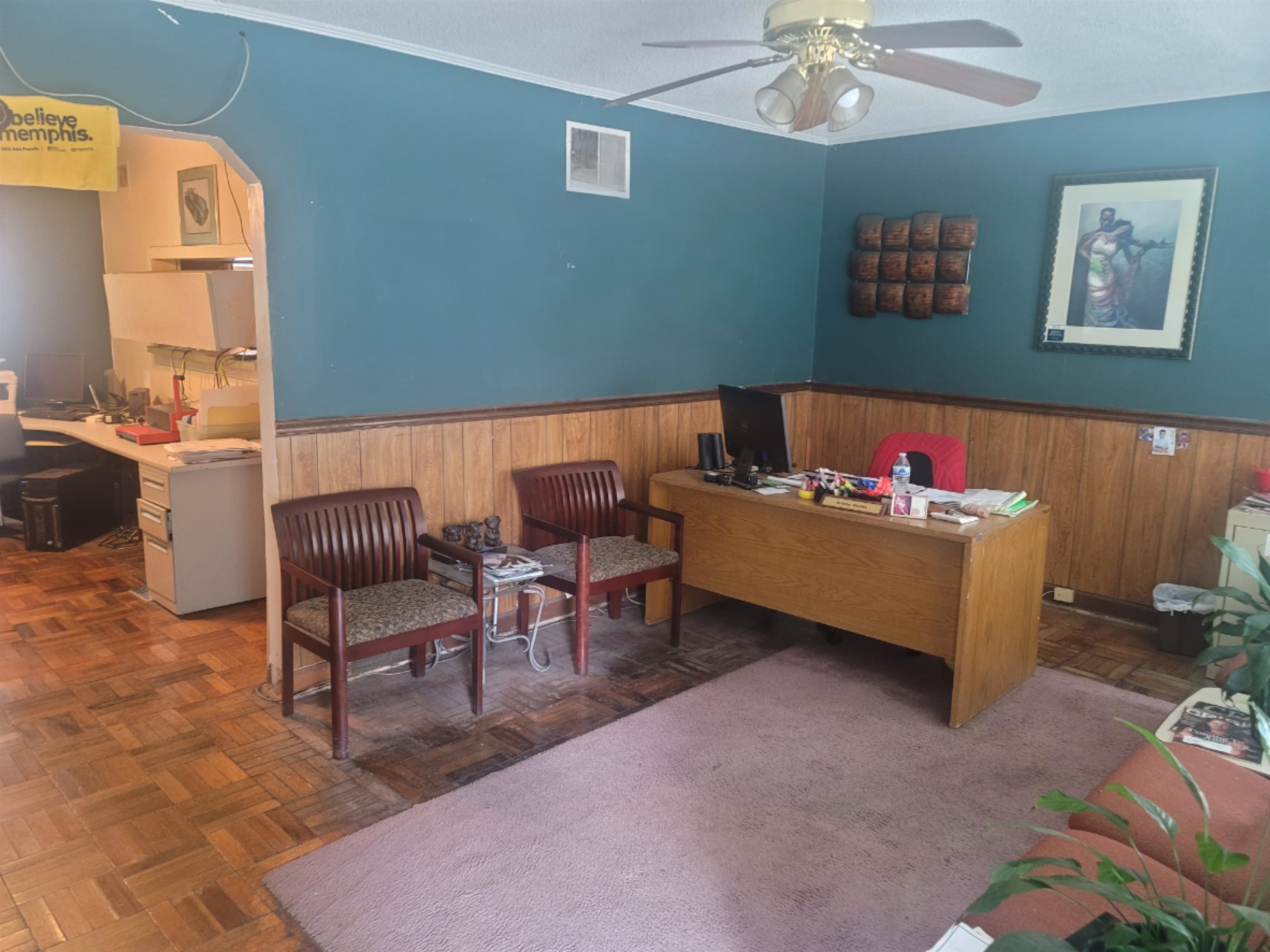 516 East Raines Road Memphis, TN 38109 - Photo 3 of 34 a living room with furniture and a window