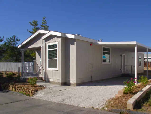 a front view of a house with garage