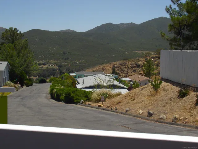 a view of a house with a street side