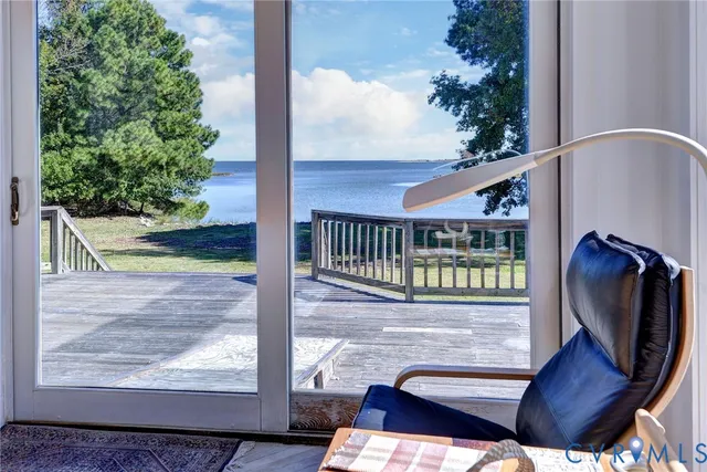 a view of entryway with wooden floor