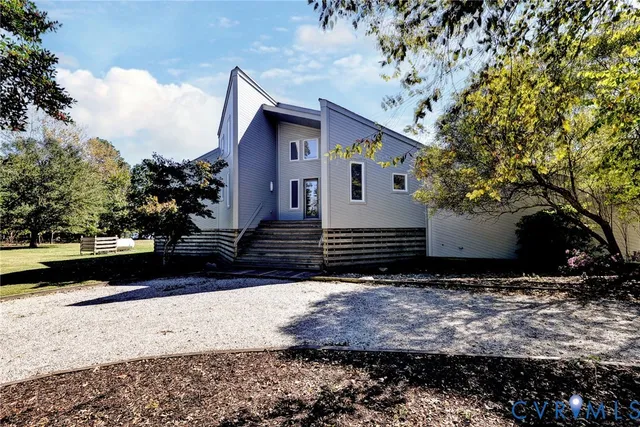 a view of house with yard