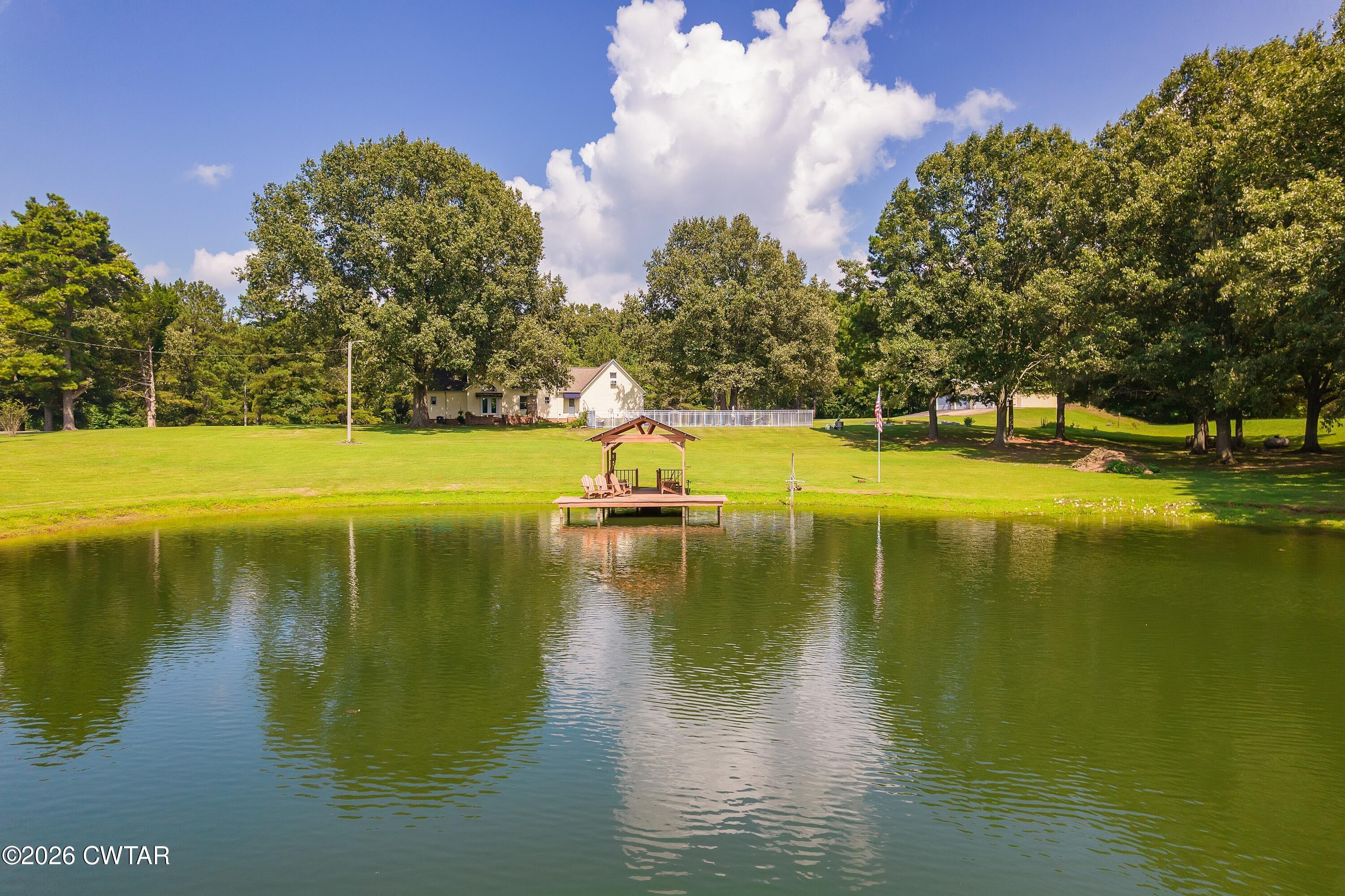 2757 Edward Williams Road Gadsden, TN 38337 - Photo 48 of 57 a view of an ocean with a large trees