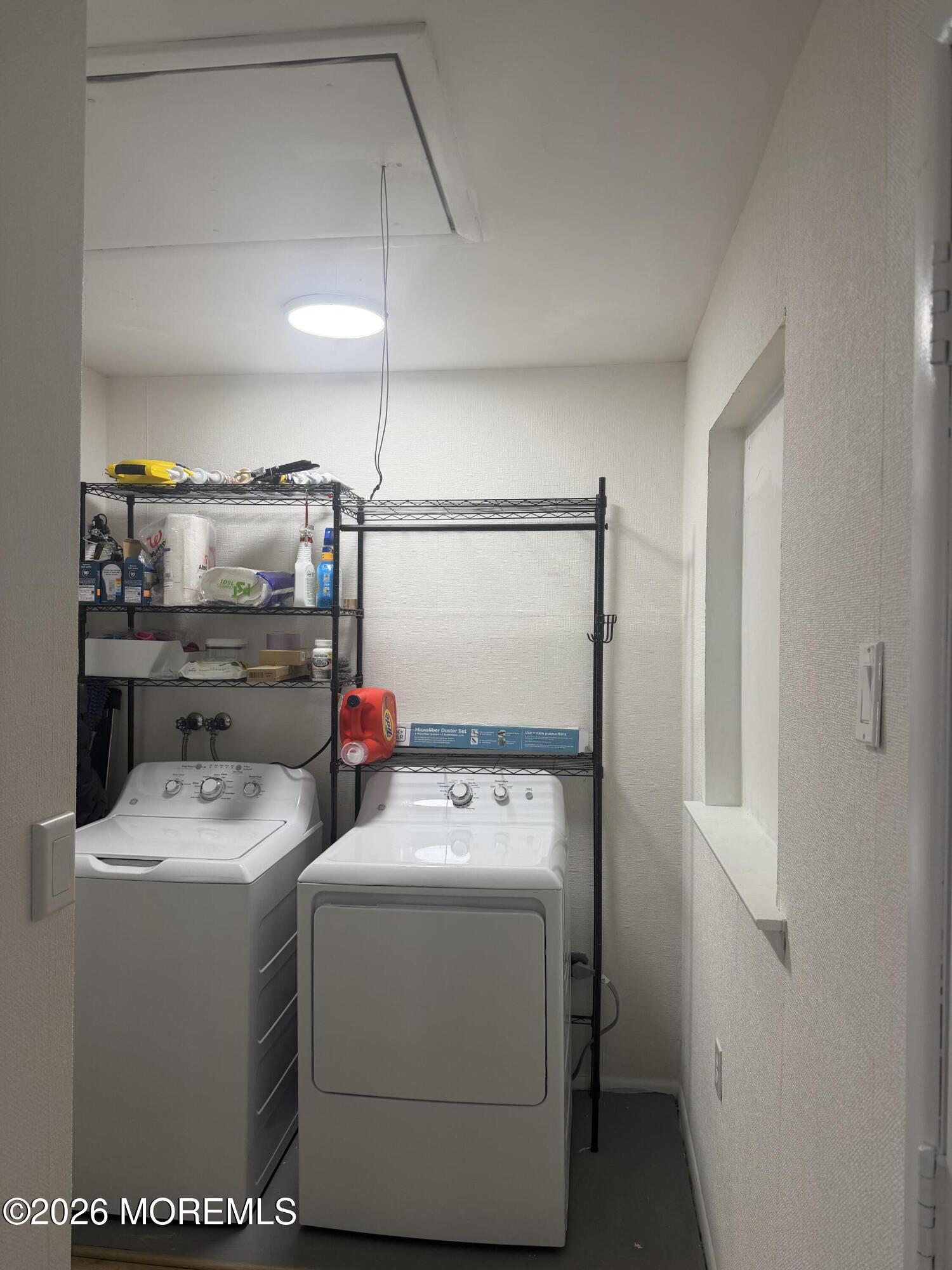 31 Homestead Drive, Unit A Whiting, NJ 08759 - Photo 21 of 23 a utility room with dryer and washer