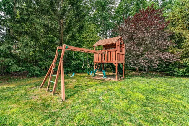 a view of a wooden deck and a slide