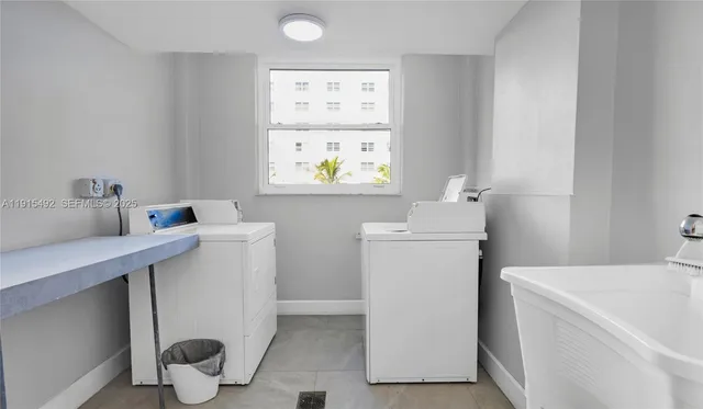 a view of a patio with dining table and chairs with wooden floor
