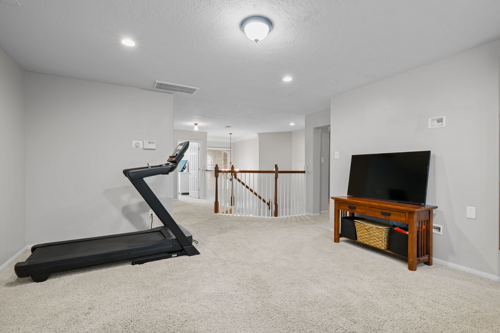 19114 Emory Trail Spring, TX 77388 - Photo 32 of 44 a living room with furniture and a flat screen tv