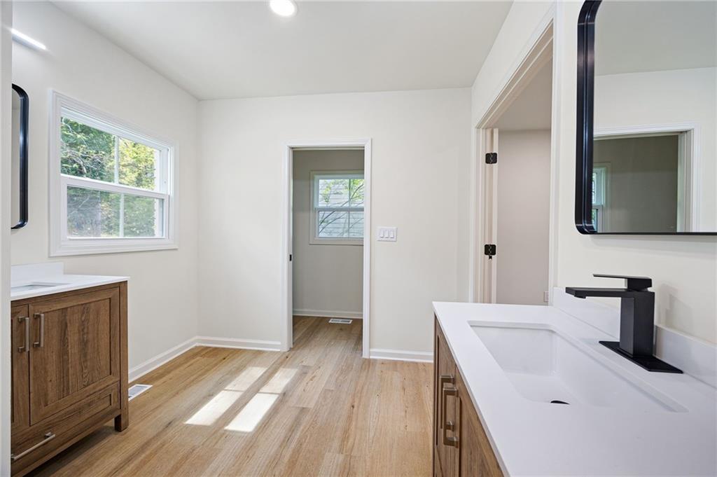 4289 Kimball Road Southwest Atlanta, GA 30331 - Photo 12 of 20 a bathroom with a sink and a mirror