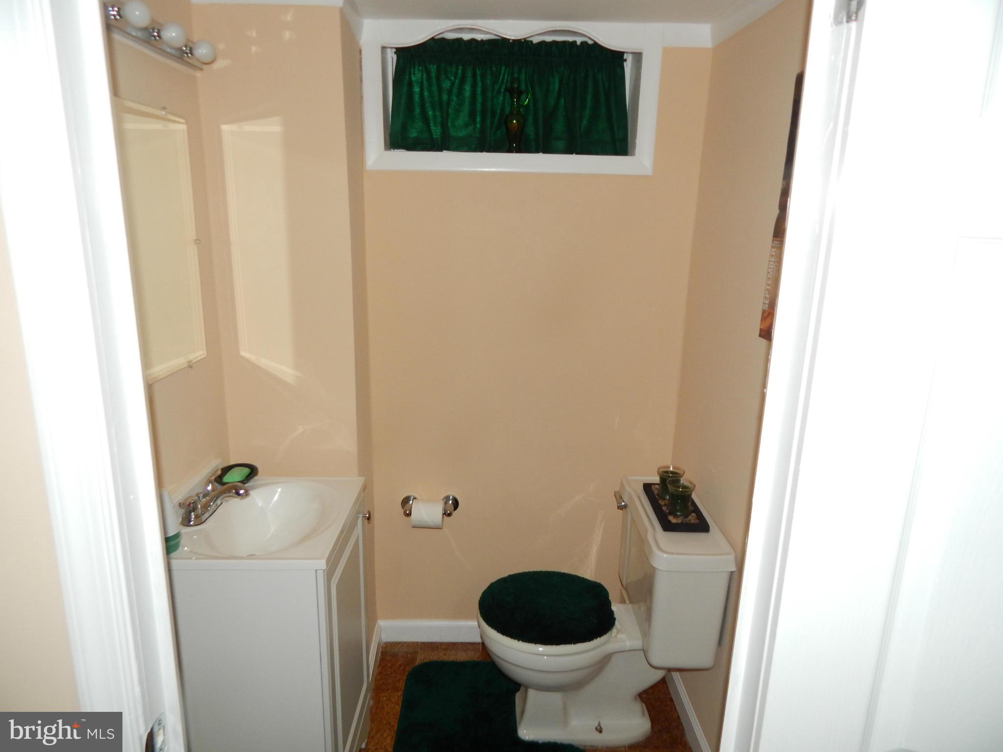 8905 Maplebrook Road Randallstown, MD 21133 - Photo 19 of 21 Basement Half Bathroom
