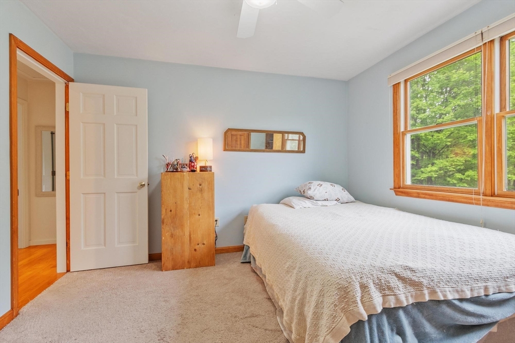 94 Turner Road Townsend, MA 01469 - Photo 24 of 42 a bedroom with a bed and a window