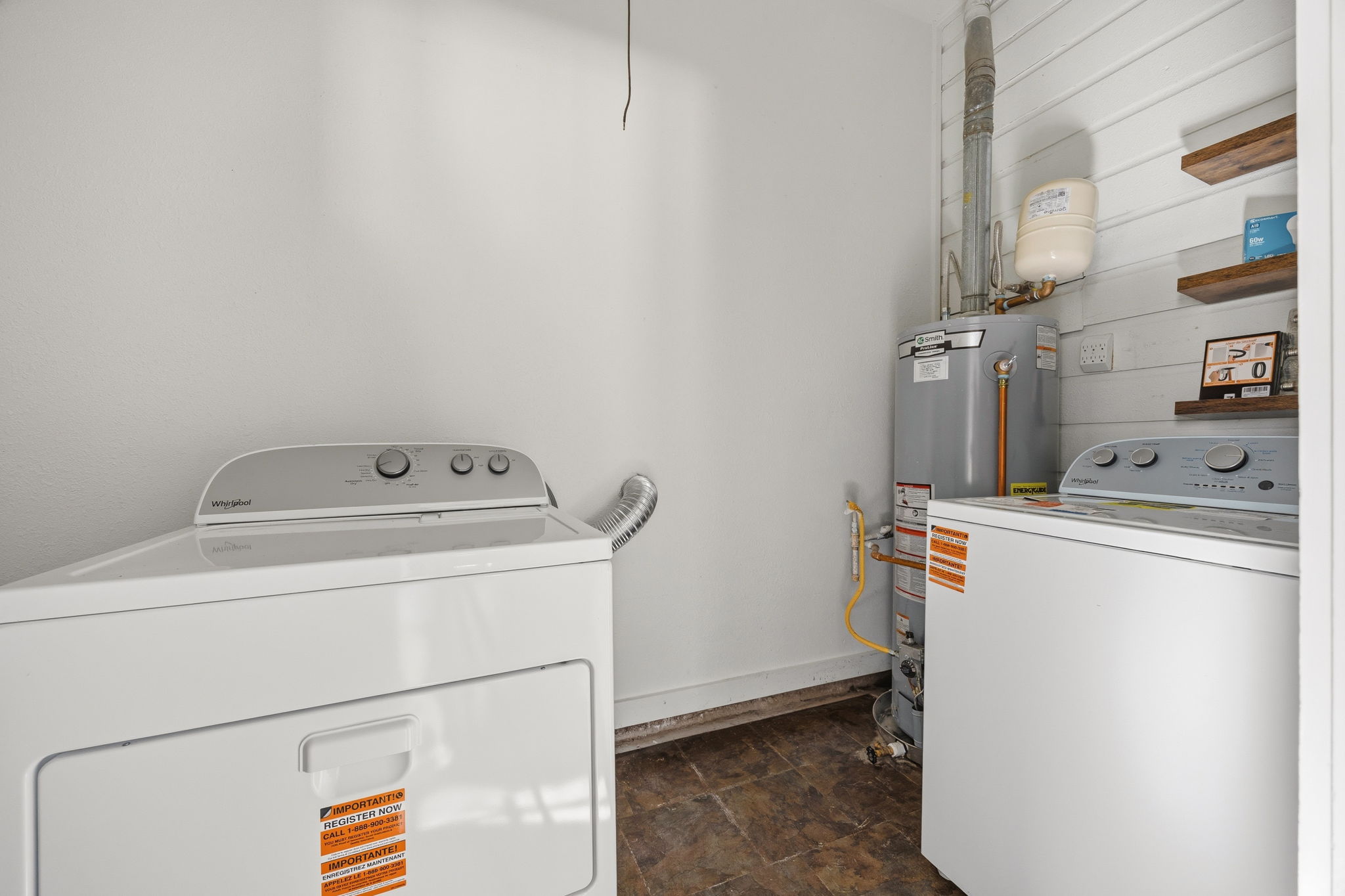 1402 Kent Street Taylor, TX 76574 - Photo 22 of 25 a utility room with dryer and washer