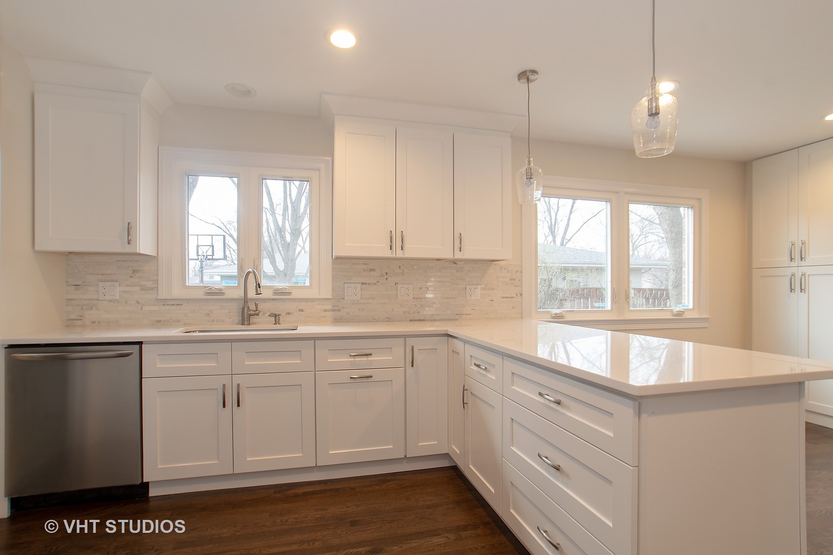 2010 Clover Road Northbrook, IL 60062 - Photo 11 of 30 a kitchen with a sink window and cabinets