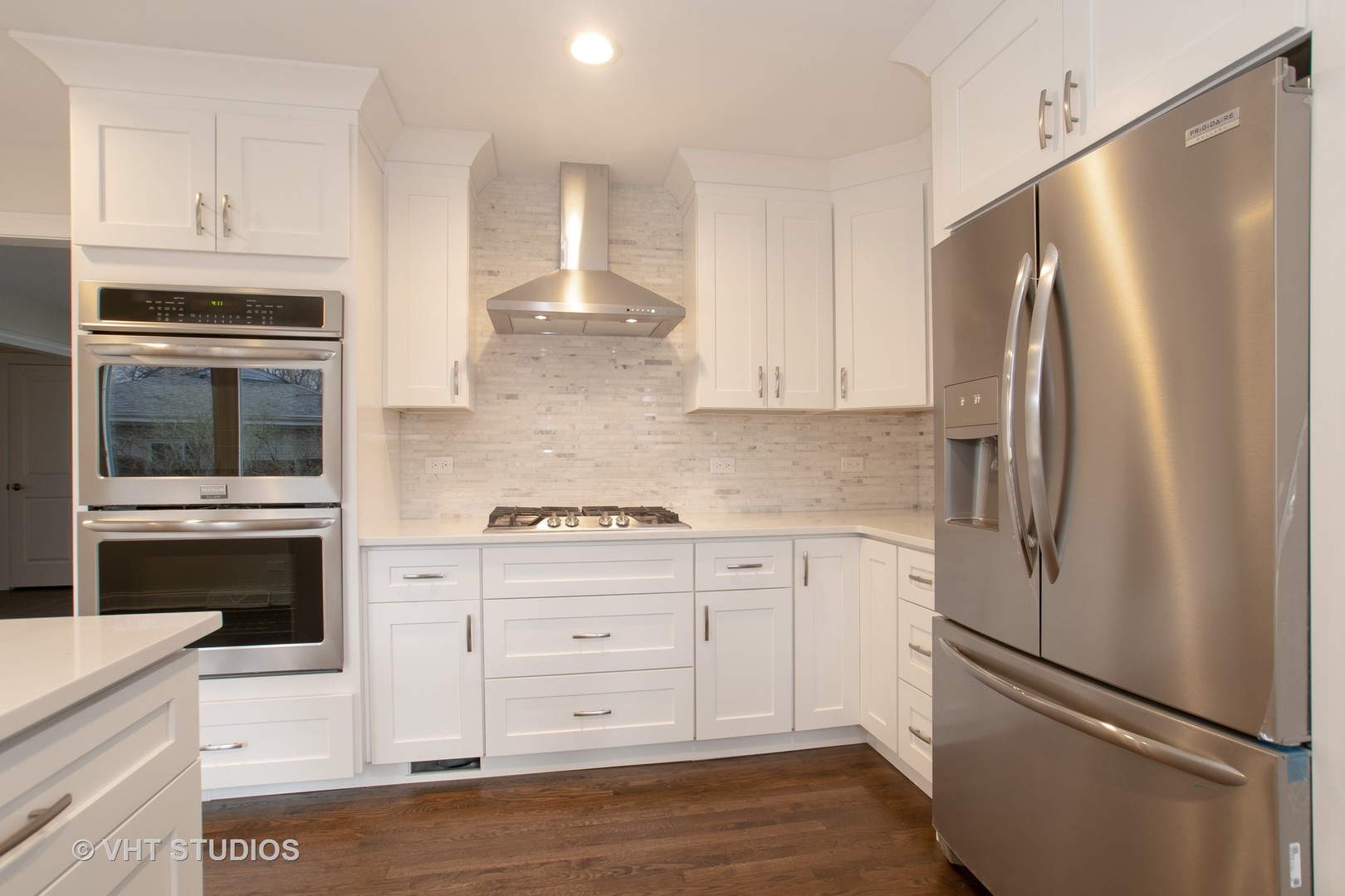 2010 Clover Road Northbrook, IL 60062 - Photo 13 of 30 a kitchen with stainless steel appliances a refrigerator stove and cabinets
