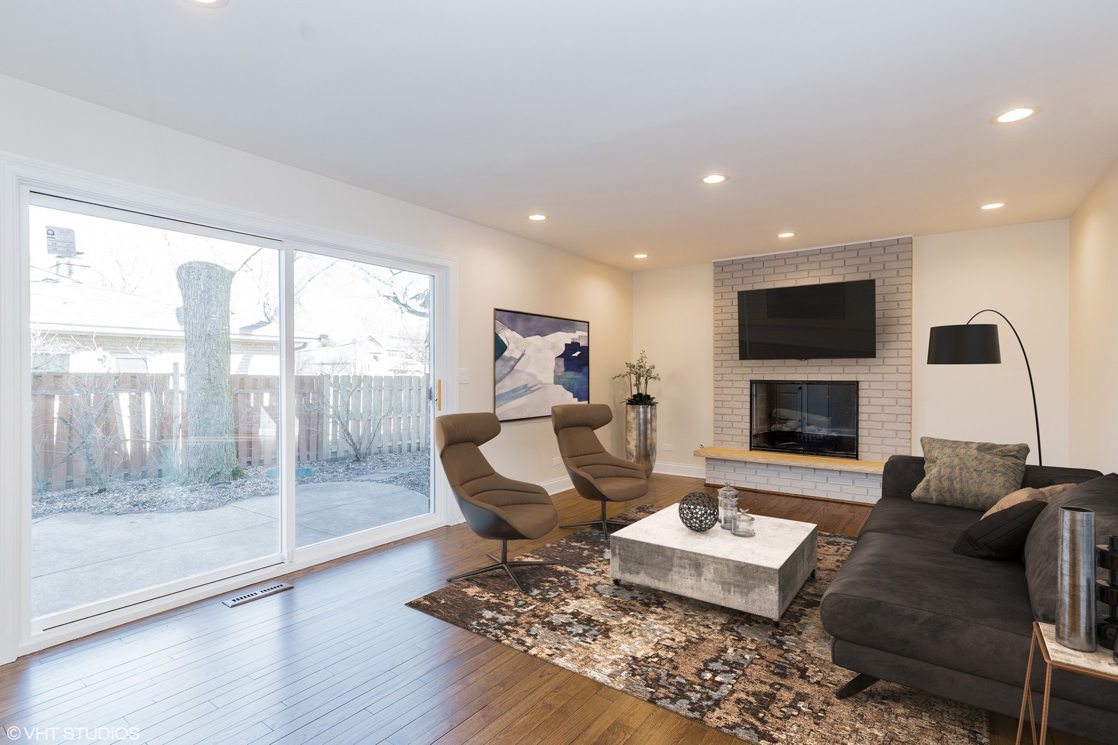 2010 Clover Road Northbrook, IL 60062 - Photo 16 of 30 a living room with furniture a flat screen tv and a fireplace