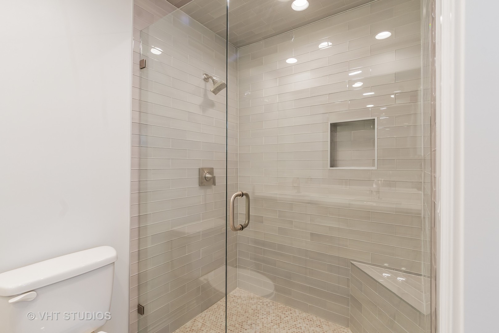 2010 Clover Road Northbrook, IL 60062 - Photo 22 of 30 a bathroom with a shower and a toilet