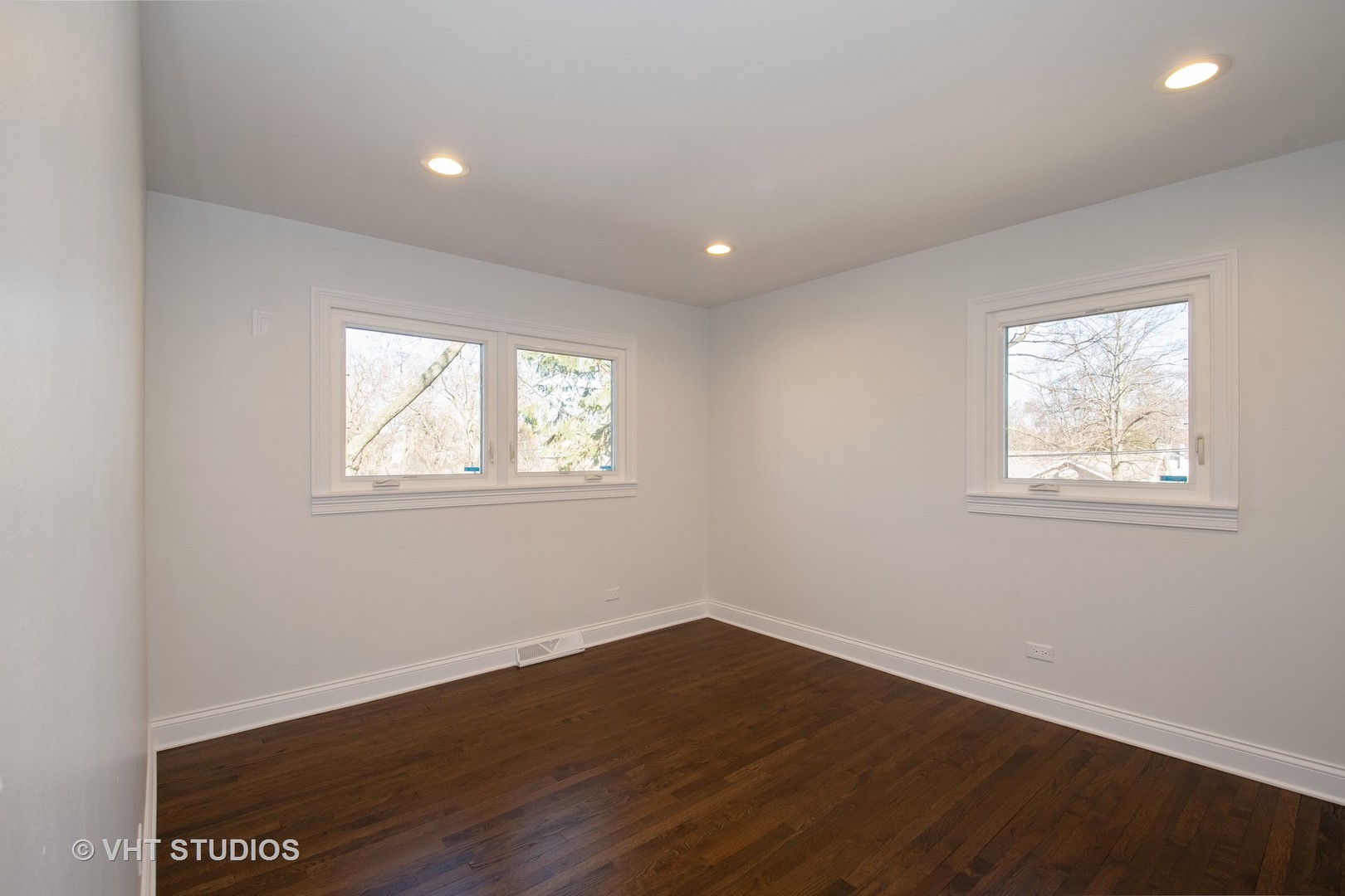 2010 Clover Road Northbrook, IL 60062 - Photo 24 of 30 a view of a room with wooden floor and windows in it