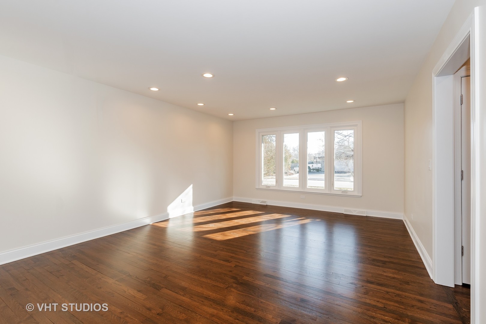 2010 Clover Road Northbrook, IL 60062 - Photo 6 of 30 a view of an empty room with wooden floor and a window