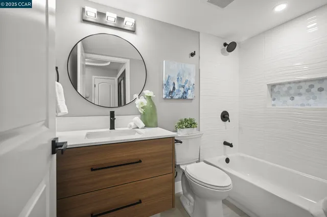 a view of washer and dryer in a utility room