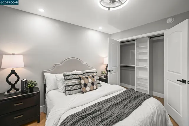 a bathroom with a double vanity sink mirror and shower