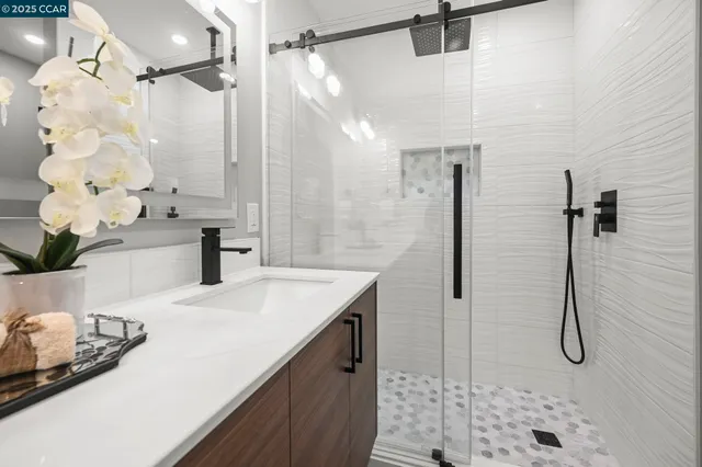a view of a livingroom with furniture and a potted plant