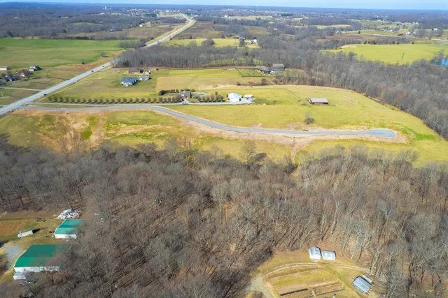 a view of a swimming pool with a lake view