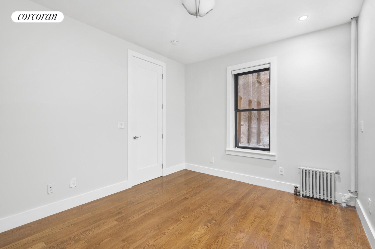 825 West 179th Street, Unit 2E Manhattan, NY 10033 - Photo 8 of 9 a view of an empty room